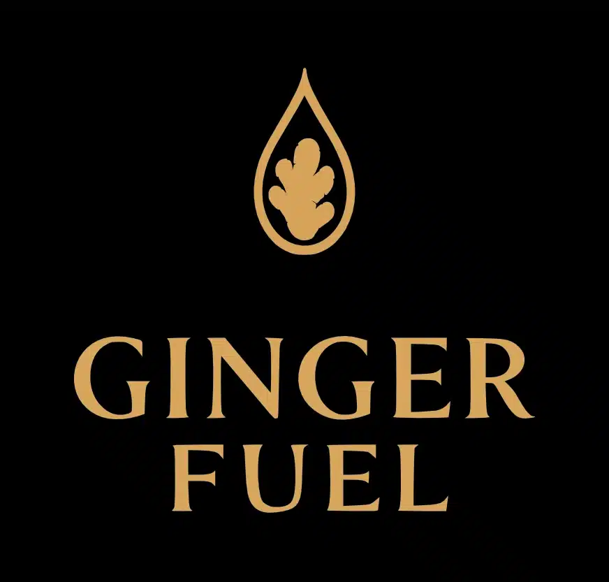 Gingerfuel logo met een goudkleurig gemberblad in een druppelvorm op een zwarte achtergrond.